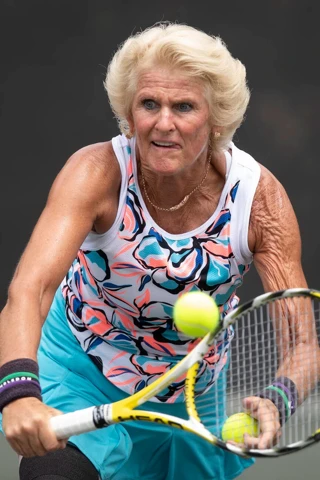 Gillian Brook and John Lloyd in action at the 2025 ITF Masters World Individual Championships